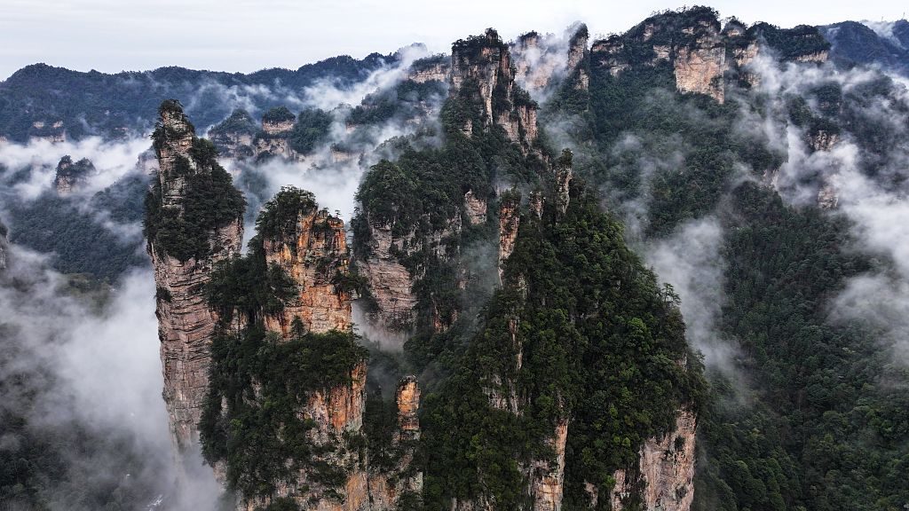 Aerial view of cloud-shrouded Zhangjiajie National Forest Park