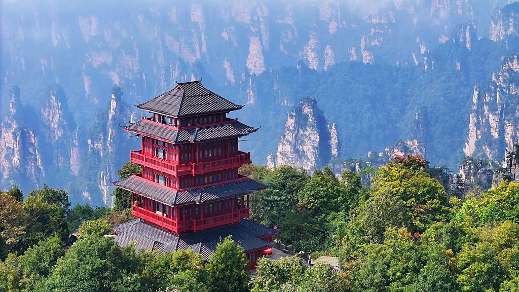 Zhangjiajie National Forest Park in autumn with traditional Chinese building