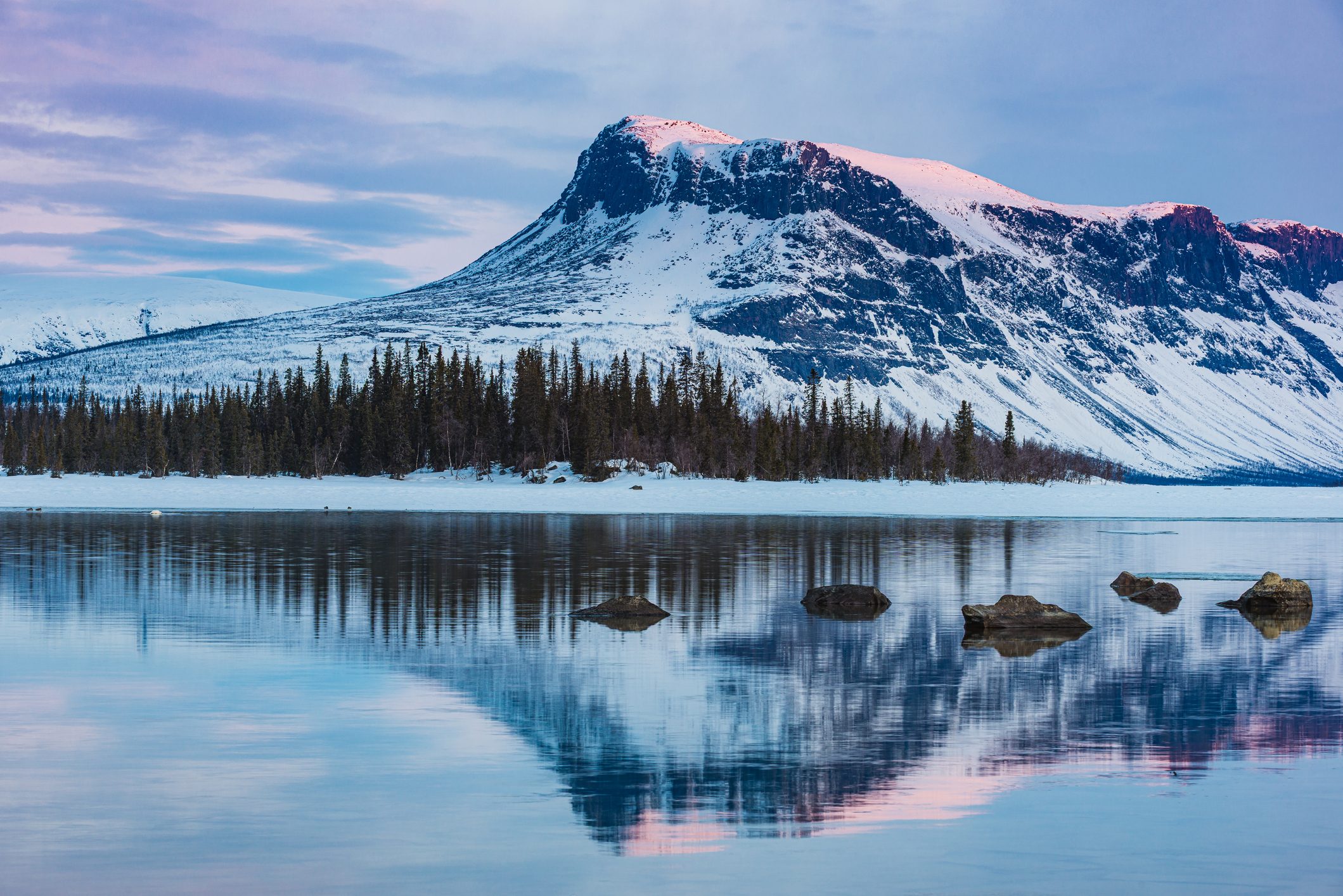 Snowcapped mountains and lake